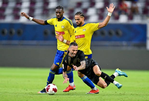 QATAR CUP 2026 SEMI-FINAL MATCH AL-SADD SC AND AL-GHARAFA SC Guilherme Torres (bottom) of Al Sadd SC and Amro Abdelfatah Surag of Al-Gharafa SC compete during the Qatar Cup 2026 semi-final match between Al-Sadd SC and Al-Gharafa SC at Khalifa International Stadium in Doha, Qatar, on September 1, 2026. DOHA Qatar Copyright: xNOUSHADx