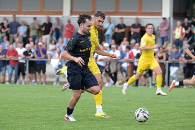 Egemen Sarikaya (TSV Ehningen, No. 10) in a tackle with Marius Uhl (SG Sonnenhof Großaspach, No. 19); TSV Ehningen vs. SG Sonnenhof Großaspach, soccer, DB Regio wfv Cup Round of 16, 2026–2027 season, September 2, 2026: TSV Ehningen vs. SG Sonnenhof Großaspach, soccer, DB Regio wfv Cup Round of 16, 2026–2027 season, September 2, 2026, Ehningen Copyright: xEibner-Pressefotox EP_TBR