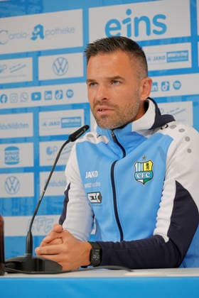 CFC Press Conference, September 2, 2026, Chemnitz, eins Stadium on Gellertstraße, CFC, Regional League Northeast, press conference ahead of the second-round match of the Wernesgrüner Saxony Cup against Dresdner SC. In attendance are head coach Benjamin Duda, press officer Nicole Ringeisen, and goalkeeper David Wunsch. Head Coach Benjamin Duda, Chemnitz, Saxony, Germany