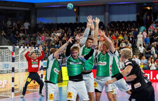 September 2, 2026 Handball 1st Bundesliga OPEL HBL 2026–2027 Season, Matchday 2: HC Erlangen (Nuremberg Metropolitan Region) HCE vs. TSV Hannover Burgdorf, Die Recken Women s Team, xdaxmax, Marek Nissen 6, HC Erlangen HCE takes a shot on goal against the defensive wall of TSV Hannover Burgdorf