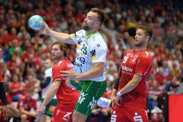 Ludvig Jurmala Aastroem, Frisch Auf Göppingen, 25 (in possession), Olle Forsell Schefvert, MT Melsungen, 25 (R), Johannes Golla, MT Melsungen, 14 (L), GER, MT Melsungen vs. Frisch Auf Göppingen, Handball, 1st Bundesliga, Matchday 2, 2026–2027 Season, September 2, 2026, GER, MT Melsungen vs. Frisch Auf Göppingen, Handball, 1st Bundesliga, Matchday 2, 2026–2027 season, September 2, 2026, Kassel Copyright: xEibner-Pressefotox xRolandxSippelx EP_RSL