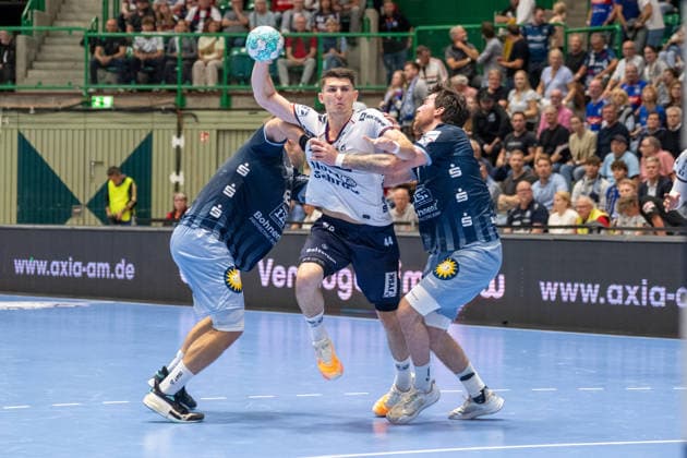Head-to-head matchup between Tom Bergner of Bergischer HC 06, 28, Aymeric Minne of SG Flensburg Handewitt, 44, and Tim Hilding of Bergischer HC 06, 17: Bergischer HC vs. SG Flensburg Handewitt, Handball, Opel HBL, Matchday 2, 2026–2027 Season, September 2, 2026 Bergischer HC vs. SG Flensburg Handewitt, Handball, Opel HBL, Matchday 2, 2026–2027 season, September 2, 2026 Wuppertal Copyright: xEibner-Pressefoto ThomasxHaeslerx EP_THR
