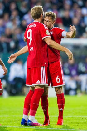 September 2, 2026 Soccer, 2026–2027, DFB Cup, 1st Round, VfL Osnabrück vs. FC Bayern Munich; L: Harry Kane; Munich celebrates after his goal to tie the game at 1–1 with Joshua Kimmich; Munich. DFB regulations prohibit any use of photographs as image sequences and or quasi-video.