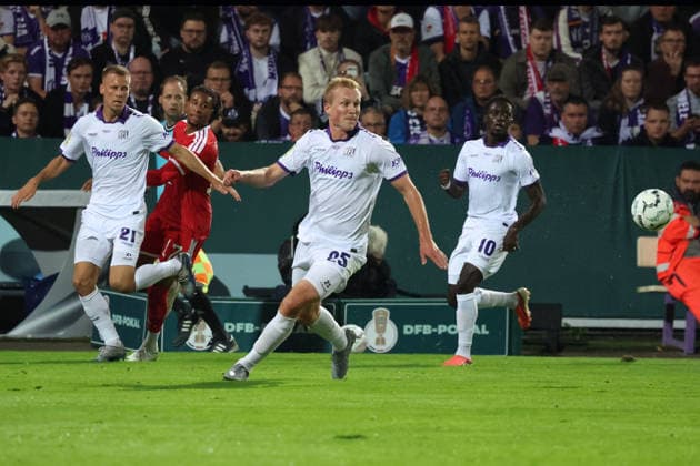 September 2, 2026, xrekx, Soccer DFB Cup 1st Round, VfL Osnabrück vs. FC Bayern Munich – Adrian Beck (VfL Osnabrück, Osnabrück), Michael Olise (FC Bayern Munich), Niklas Wiemann (VfL Osnabrück, Osnabrück) – tackle, action, battle for the ball, Osnabrück