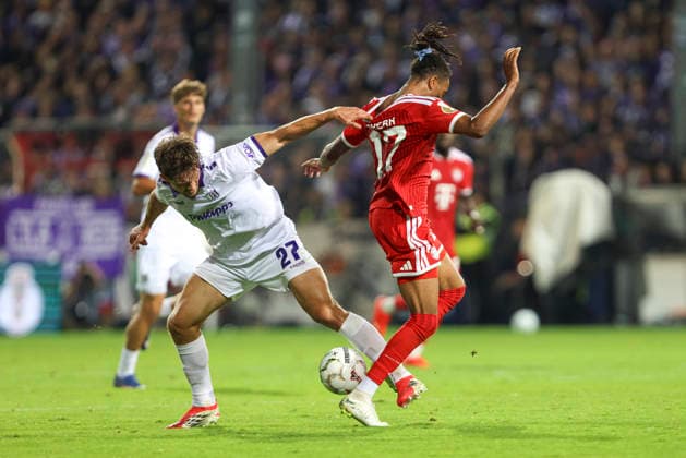 Robin Fabinski of VfL Osnabrück and Michael Olise of FC Bayern Munich battle for the ball during the DFB Cup match between VfL Osnabrück and FC Bayern Munich at Bremer Brücke on September 2, 2026, in Osnabrück, Germany. Photo by Oliver Kaelke, DeFodi Images. Robin Fabinski of VfL Osnabrück and Michael Olise of FC Bayern Munich battle for the ball during the DFB Cup match between VfL Osnabrück and FC Bayern Munich at Bremer Brücke on September 2, 2026 in Osnabrück, Germany. Photo by Oliver Kaelke, DeFodi Images. Photo by Oliver Kaelke, DeFodi Images.