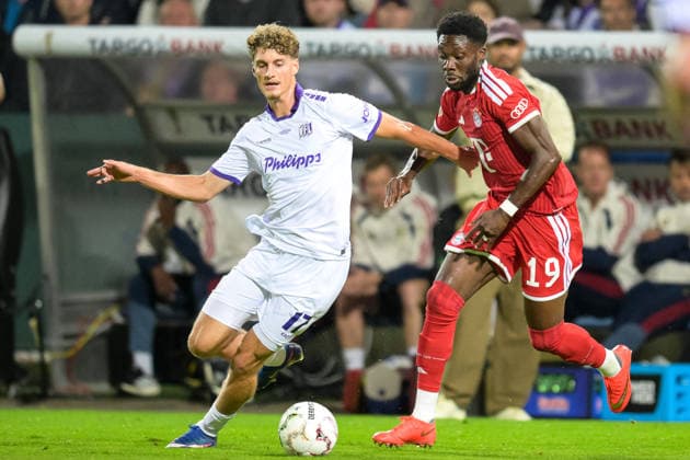 Soccer, DFB Cup, 20260902, VfL Osnabrück vs. FC Bayern Munich. Pictured, from left: Luca RAIMUND (Osnabrück, 17) and Alphonso DAVIES (Bayern, 19). Tackle for the ball at the Osnatel Arena in Osnabrück, Lower Saxony, Germany. Copyright: Passion2Press MarkusxFischerx
