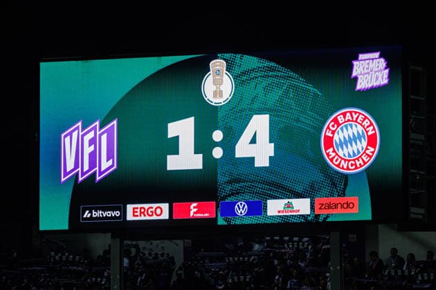 The final score of 1–4 is displayed on the scoreboard: GER, VfL Osnabrück vs. FC Bayern Munich, Soccer, DFB Cup, 1st Round, 2026–2027 season, September 2, 2026 DFL regulations prohibit the use of photographs as image sequences and or quasi-video GER, VfL Osnabrück vs. FC Bayern Munich, Soccer, DFB Cup, Round 1, 2026–2027 season, September 2, 2026, Osnabrück Copyright: xEibner-Pressefoto JanxRollingerx EP_JSK