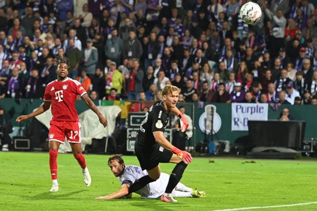 Michael OLISE M scores the goal to make it 1–3 against Jannik MUELLER Müller, VfL Osnabrück, and goalkeeper Jonas KRUMREY, VfL Osnabrück; action, tackle, soccer, DFB Cup, 1st round, VfL Osnabrück vs. FC Bayern Munich on September 2, 2026, at the Stadion an der Bremer Brücke in Osnabrück, Germany. DFL and DFB regulations prohibit any use of photographs as image sequences and or quasi-video.