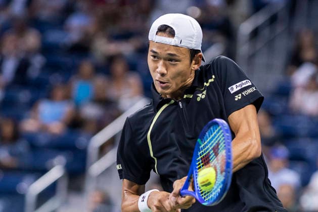 Rei Sakamoto of Japan returns a ball to Frances Tiafoe in the first set of their second round match in Louis Armstrong Stadium at the 2026 US Open Tennis Championships at the USTA Billie Jean King National Tennis Center in New York City on Wednesday, September 2, 2026.  NYP20260902306 COREYxSIPKIN