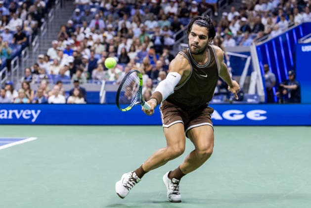 Carlos Alcaraz of Spain returns a ball to Jaime Faria of Portugal in the first set of their second round match in Arthur Ashe Stadium at the 2026 US Open Tennis Championships at the USTA Billie Jean King National Tennis Center in New York City on Wednesday, September 2, 2026.  NYP20260902319 COREYxSIPKIN