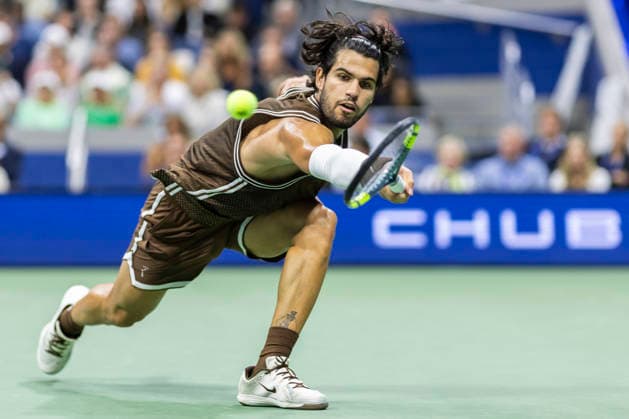 Carlos Alcaraz of Spain returns a ball to Jaime Faria of Portugal in the second set of their second round match in Arthur Ashe Stadium at the 2026 US Open Tennis Championships at the USTA Billie Jean King National Tennis Center in New York City on Wednesday, September 2, 2026.  NYP20260902326 COREYxSIPKIN