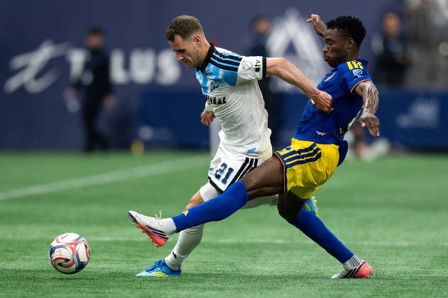 September 2, 2026, Vancouver, Bc, CANADA: CF Montreal s Fabian Herbers, left, is stopped by Vancouver Whitecaps Sam Adekugbe during first half Canadian Championship semifinal soccer action in Vancouver on Wednesday, September 2, 2026. Canada News - September 2, 2026  - ZUMAc35_ 20260902_zaf_c35_125 Copyright: xEthanxCairnsx