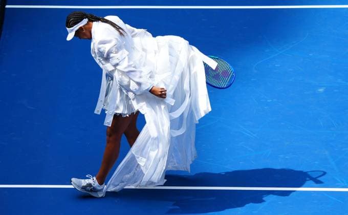Naomi Osaka almost treads on her dress after walking on to court ahead of her second round match against Katerina Siniakova 2026 US Open, Day Five, USTA Billie Jean King National Tennis Center, New York, USA - 03 Sep 2026New York USTA Billie Jean King National T New York (NY) United States of America EDITORIAL USE ONLY No use with unauthorised audio, video, data, fixture lists, club league logos or live services. Online in-match use limited to 120 images, no video emulation. No use in betting, games or single club league player publications.  Copyright: xJavierxGarcia Shutterstockx 17132980e