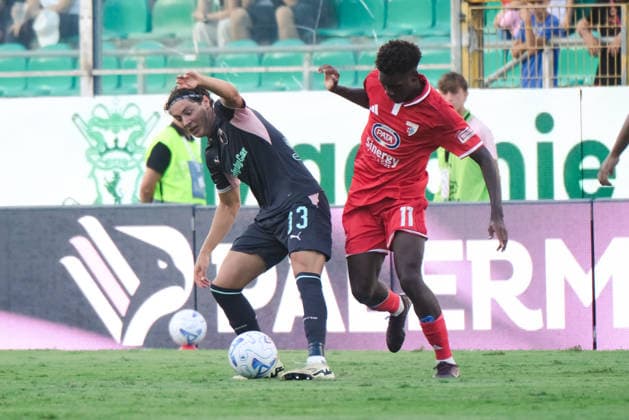 IPA88073359 - Palermo, Italy, September 3, 2026. Renzo Barbera Stadium, Palermo vs. Mantua, Round of 32 of the 2026–2027 Italian Cup. Pictured: Andra Bozzolan (Palermo FC) and Ismael Cajazzo (Mantova 1911)  Copyright: xFedericoxSerra IPAxSportx xx 88073359