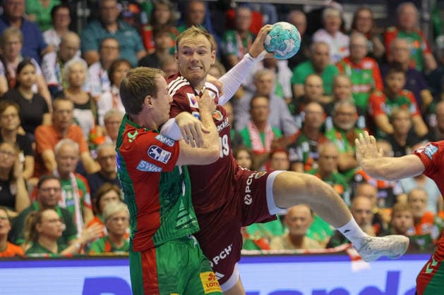 September 3, 2026, xtgx, Opel HBL Handball, SC Magdeburg vs. Füchse Berlin emspor, from left: Felix Claar (Magdeburg), 7 Mathias Gidsel (Berlin), 19: A duel, a battle, a tackle—Magdeburg
