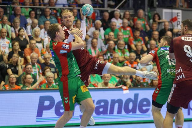 September 3, 2026, xtgx, Opel HBL Handball, SC Magdeburg vs. Füchse Berlin emspor, from left: Felix Claar (Magdeburg), 7 Mathias Gidsel (Berlin), 19: A duel, a battle, a tackle—Magdeburg