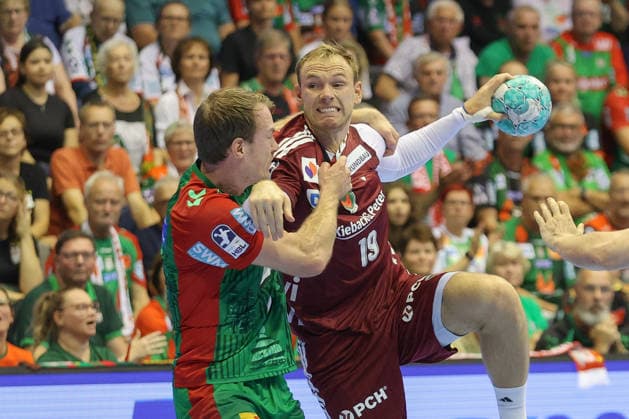 September 3, 2026, xtgx, Opel HBL Handball, SC Magdeburg vs. Füchse Berlin emspor, from left: Felix Claar (Magdeburg), 7 Mathias Gidsel (Berlin), 19: A duel, a battle, a tackle—Magdeburg