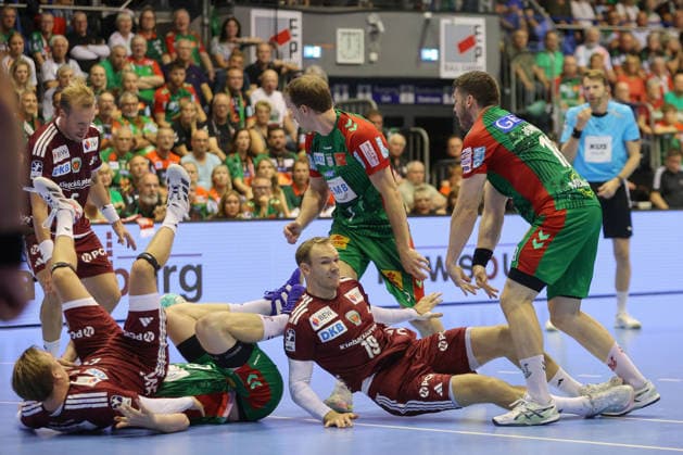 September 3, 2026, xtgx, Opel HBL handball, SC Magdeburg vs. Füchse Berlin emspor, from left: Felix Claar (Magdeburg), 7 Mathias Gidsel (Berlin), 19 Elvar Orn Jonsson (Magdeburg), 19: Tussle, duel, battle, tackle (Magdeburg)