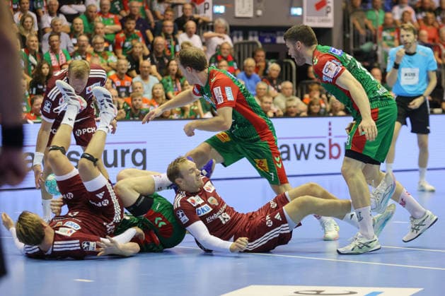 September 3, 2026, xtgx, Opel HBL handball, SC Magdeburg vs. Füchse Berlin emspor, from left: Felix Claar (Magdeburg), 7 Mathias Gidsel (Berlin), 19 Elvar Orn Jonsson (Magdeburg), 19: Tussle, duel, battle, tackle (Magdeburg)