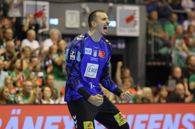 September 3, 2026, xtgx, Opel HBL Handball, SC Magdeburg vs. Füchse Berlin emspor, from left: Matej Mandic (Magdeburg), 12 celebrating a saved shot, blocked, saved, Magdeburg goalkeeper