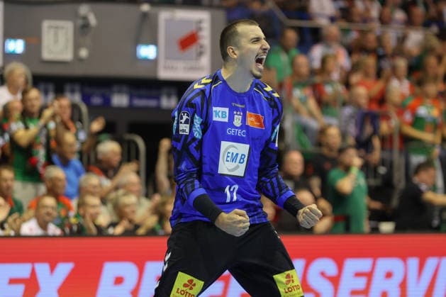 September 3, 2026, xtgx, Opel HBL Handball, SC Magdeburg vs. Füchse Berlin emspor, from left: Matej Mandic (Magdeburg), 12 celebrating a saved shot, blocked, saved, Magdeburg goalkeeper