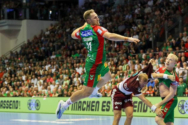 September 3, 2026, xgox, Handball Opel HBL SC Magdeburg vs. Füchse Berlin emspor, from left: Albin Lagergren (Magdeburg), 21 shots on goal, goal scorer, scores a goal, goal, scores the goal (Magdeburg)