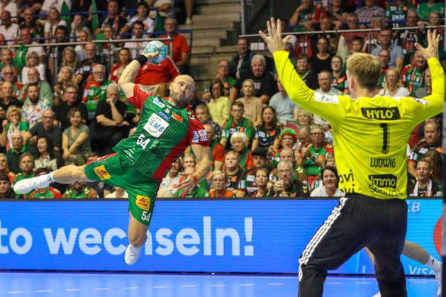 September 3, 2026, xgox, Handball Opel HBL SC Magdeburg vs. Füchse Berlin emspor, from left: Oscar Bergendahl (Magdeburg), No. 54, takes a shot, goal scorer, scores a goal, Magdeburg