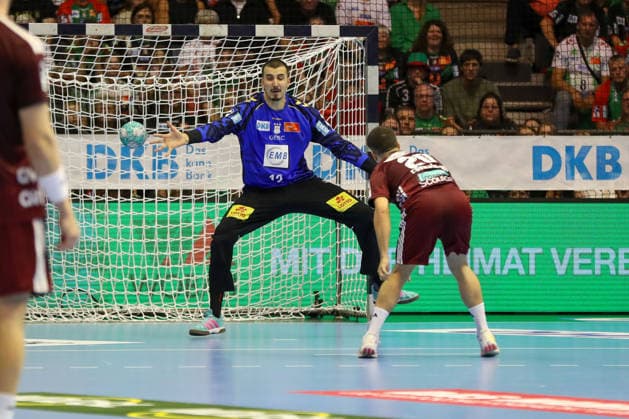 September 3, 2026, xgox, Handball Opel HBL SC Magdeburg vs. Füchse Berlin (emspor), from left: Matej Mandic (Magdeburg), 12 on a penalty throw against Tim Freihöfer (Berlin), 20 (Magdeburg)