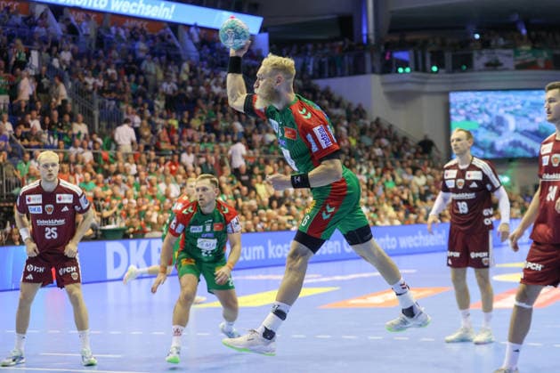 September 3, 2026, xtgx, Opel HBL Handball, SC Magdeburg vs. Füchse Berlin emspor, from left: Matthias Musche (Magdeburg), 6 takes a shot, goal scorer, scores a goal, Magdeburg
