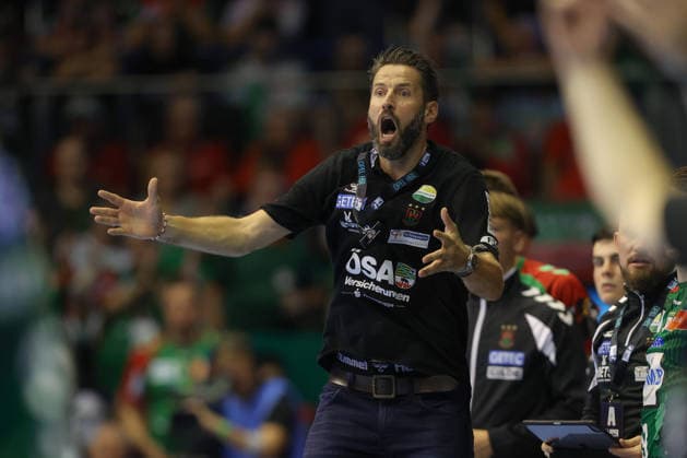 September 3, 2026, xtgx, Opel HBL Handball, SC Magdeburg vs. Füchse Berlin emspor, from left: Bennet Wiegert (Magdeburg), coach giving instructions, gesturing with his arms, gesticulate, gives instructions (Magdeburg)
