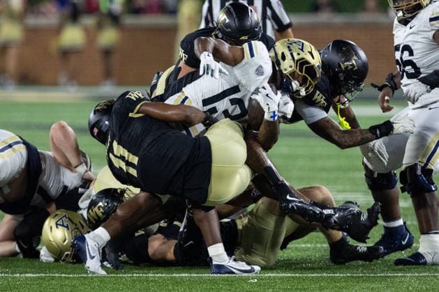 NCAA, College League, USA Football 2026: Akron At Wake Forest Sep 03 September 3, 2026: Wake Forest Demon Deacons linebacker Langston Hardy (11) tackles Akron Zips running back Sean Patrick (13) for a loss during the first half of the NCAA football match up at Allegacy Stadium in Winston-Salem, NC. Mandatory Credit: Scott Kinser-Cal Media (Credit Image: Â Scott Kinser Cal Sport Media) Winston-Salem Nc United States EDITORIAL USE ONLY Copyright: xx ZUMA-20260903_zma_c04_074.jpg ScottxKinserx csmphotothree516535