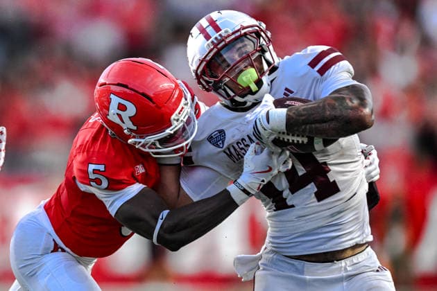 September 3, 2026, Piscataway, Nj, USA: 09 03 26 Massachusetts Minutemen running back Curtis Kimmons IV (14) tries to break the tackle of Rutgers Scarlet Knights defensive back Bradlee Jones (5) during the 1st half of the football game between the Massachusetts Minutemen and Rutgers Scarlet Knights at SHI Stadium, Thursday Sept. 3, 2026. Massachusetts Minutemen V Rutgers Scarlet Knights  - ZUMAc268 20260903_zsp_c268_019 Copyright: xJamesxPatrickxCooperx