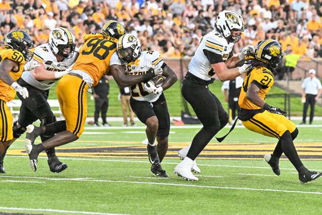COLUMBIA, MO - SEPTEMBER 03: Arkansas-Pine Bluff Golden Lions defensive end Keiyhaun Wilks (98) stops the rush attempt of Missouri Tigers running back Jamal Roberts (20) during a non conference game between the Arkansas Pine Bluff Golden Lions and the Missouri Tigers held on Thursday September 03, 2026 at Faurot Field at Memorial Stadium in Columbia MO. (Photo by Rick Ulreich Icon Sportswire) COLLEGE FOOTBALL: SEP 03 Ark.-Pine Bluff at Missouri EDITORIAL USE ONLY Icon26090308