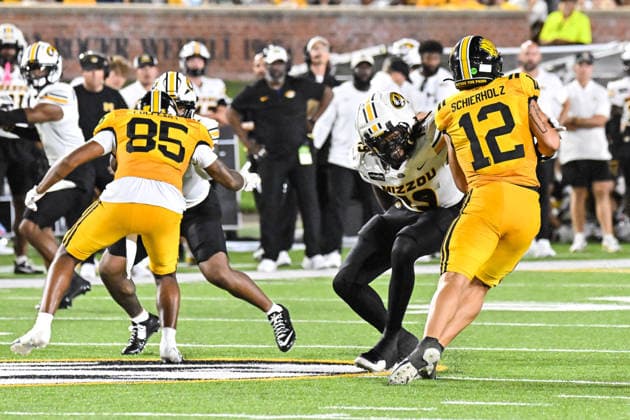 COLUMBIA, MO - SEPTEMBER 03: Arkansas-Pine Bluff Golden Lions quarterback Jack Schierholz (12) can™t slip past the tackle attempt of Missouri Tigers defensive end Darris Smith (19) during a non conference game between the Arkansas Pine Bluff Golden Lions and the Missouri Tigers held on Thursday September 03, 2026 at Faurot Field at Memorial Stadium in Columbia MO. (Photo by Rick Ulreich Icon Sportswire) COLLEGE FOOTBALL: SEP 03 Ark.-Pine Bluff at Missouri EDITORIAL USE ONLY Icon26090328