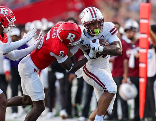 September 3, 2026: Rutgers Scarlet Knights defensive back Bradlee Jones (5) tries to wrap up UMass Minutemen running back Curtis Kimmons IV (14) during a NCAA, College League, USA football game between the UMass minutemen and the Rutgers Scarlet Knights at SHI Stadium in Piscataway, NJ. CSM Piscataway United States of America - ZUMAc04_ 20260903_zma_c04_175 Copyright: xMikexLangishx