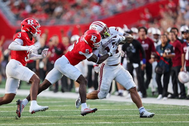 September 3, 2026: Rutgers Scarlet Knights defensive back Bradlee Jones (5) tries to wrap up UMass Minutemen running back Curtis Kimmons IV (14) during a NCAA, College League, USA football game between the UMass minutemen and the Rutgers Scarlet Knights at SHI Stadium in Piscataway, NJ. CSM NCAA Football 2026: UMass V Rutgers SEP 3  - ZUMAc04_ 20260903_zma_c04_173 Copyright: xMikexLangishx
