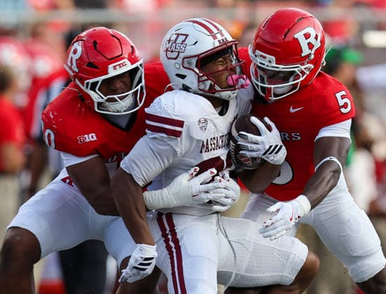 September 3, 2026: UMass Minutemen running back Elijah Faulkner (23) gets sandwiched between two defenders during a NCAA, College League, USA football game between the UMass minutemen and the Rutgers Scarlet Knights at SHI Stadium in Piscataway, NJ. CSM Piscataway United States of America - ZUMAc04_ 20260903_zma_c04_187 Copyright: xMikexLangishx