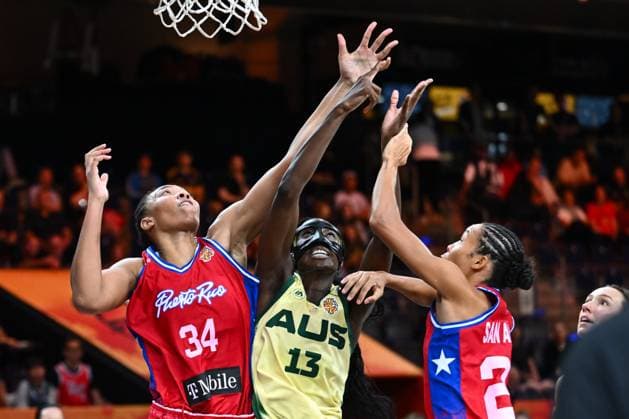 Australia v Puerto Rico - FIBA Women s Basketball World Cup 2026 BERLIN, GERMANY - SEPTEMBER 04 : Mcgee-Stafford Imani center of Puerto Rico, Magbegor Ezi power forward of Australia during the FIBA Women s Basketball World Cup group C phase match between Australia and Puerto Rico in Berlin on September 4, 2026 in Berlin, Germany, 04 09 2026 Berlin Germany  Copyright: xVincentxKalutx