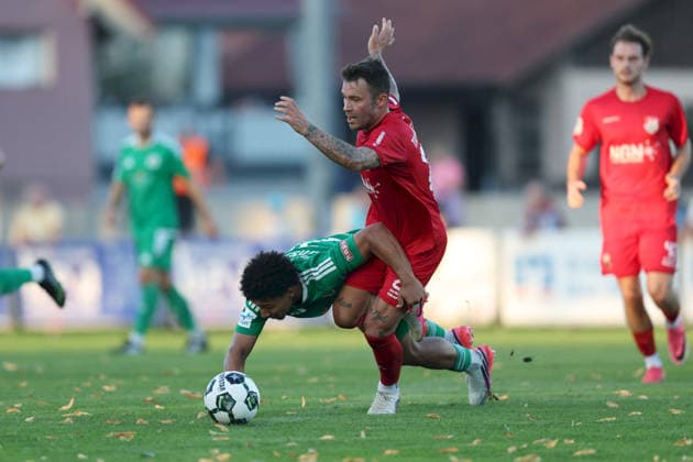 September 4, 2026, Men s, Soccer, 2026–2027 Season, Bavarian Regional League, Matchday 7: TSV Aubstadt vs. SpVgg Ansbach; Tyron Koomson (20), SpVgg Ansbach, and Ingo Feser (23), TSV Aubstadt; Sulzfeld School Stadium, Aubstadt, NGN Arena, Bavaria, Germany