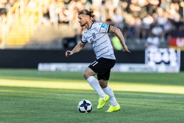 SSV Ulm 1846 Soccer vs. SGV Freiberg Heilbronn, Soccer, Regionalliga Southwest, Matchday 5, Donaustadion Ulm, September 4, 2026; cropped single image by Dennis Chessa, SSV Ulm 1846 soccer; 11 SSV Ulm 1846 soccer vs. SGV Freiberg Heilbronn, soccer, Regionalliga Southwest, Matchday 5, Donaustadion Ulm, September 26, 2004; Photo by Lucca Fundel; Ulm Donaustadion, Baden-Württemberg, Germany