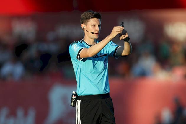 September 4, 2026, Men s, Soccer, 2026–2027 season, Bavarian Regional League, Matchday 7: TSV Aubstadt vs. SpVgg Ansbach. Referee Johannes Wagner of DJK Ingolstadt gestures with his arms and hands while giving instructions at the Sulzfeld School Stadium in Aubstadt, NGN Arena, Bavaria, Germany
