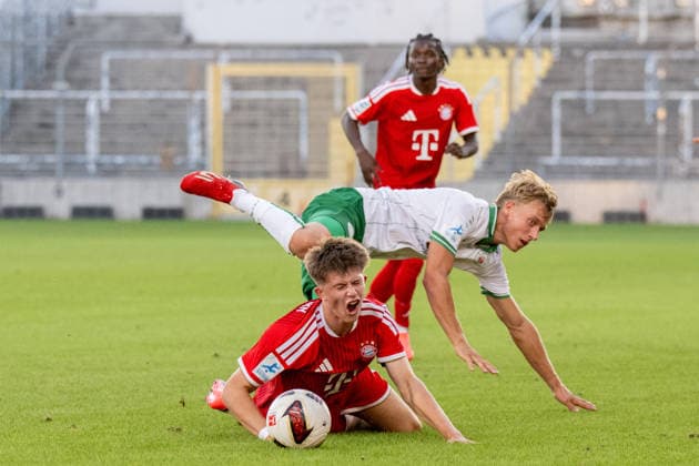 Matous Srb 11, FC Bayern Munich Amateurs; Elias Herger 11, VfB Eichstätt, tackle; FC Bayern II vs. VfB Eichstätt, soccer, Bavarian Regional League, Matchday 7, September 4, 2026 DFB regulations prohibit any use of photographs as image sequences and or quasi-video Munich, Bavaria, Germany Copyright: xkolbert-press UlrichxGamelx