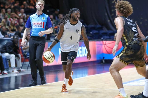 September 4, 2026, xgox, Basketball Exhibition Game: Basketball, Löwen Braunschweig vs. Bamberg Baskets, emspor, from left: Jordan Jones (Bamberg), No. 4 with the ball, plays the ball (Braunschweig)
