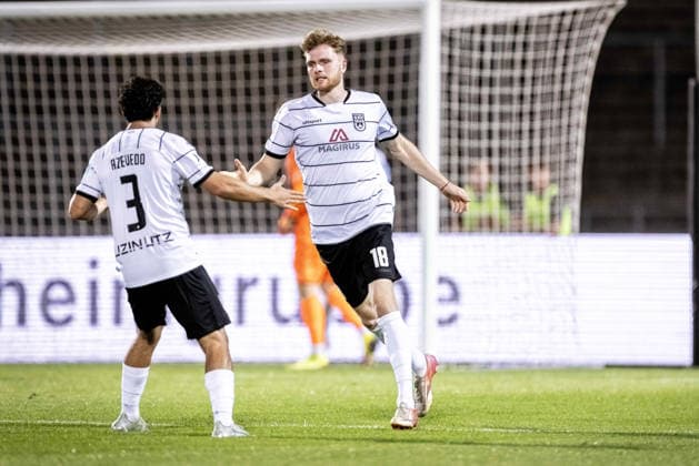 SSV Ulm 1846 Soccer vs. SGV Freiberg Heilbronn, Soccer, Regionalliga Southwest, Matchday 5, Donaustadion Ulm, September 4, 2026—Goal celebration, cheers, and joy after Steffen Meuer scores the 2-3 goal for SSV Ulm 1846 Soccer; 18th from the left: Alexandre Azevedo of SSV Ulm 1846 Soccer, 03, Steffen Meuer SSV Ulm 1846 Soccer, 18 SSV Ulm 1846 Soccer vs. SGV Freiberg Heilbronn, Soccer, Southwest Regional League, Matchday 5, Donaustadion Ulm, September 4, 2026; Photo by Lucca Fundel, Ulm Donaustadion, Baden-Württemberg, Germany