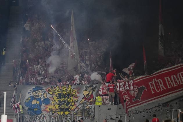 FC Koeln Fans beim abbrennen vom Pyrotechnik waehrend des spiels der 1. Bundesliga zwischen VfB Stuttgart und 1. FC Koeln, MHPArena am 04. September 2026 in Stuttgart, Deutschland. (Foto von Harry Langer DeFodi Images) +++ FC Koeln Supporters setting off Pyrotechnics during the Bundesliga match between VfB Stuttgart and 1. FC Koeln at MHPArena on September 4, 2026 in Stuttgart, Germany. (Photo by Harry Langer DeFodi Images) DFB DFL REGULATIONS PROHIBIT ANY USE OF PHOTOGRAPHS AS IMAGE SEQUENCES AND OR QUASI-VIDEO. (Photo by Harry Langer DeFodi Images) DFB DFL REGULATIONS PROHIBIT ANY USE OF PHOTOGRAPHS AS IMAGE SEQUENCES AND OR QUASI-VIDEO. - *** FC Cologne fans setting off pyrotechnics during the Bundesliga match between VfB Stuttgart and 1 FC Cologne, at the MHPArena on September 4, 2026, in Stuttgart, Germany. Photo by Harry Langer, DeFodi Images. FC Cologne supporters setting off pyrotechnics during the Bundesliga match between VfB Stuttgart and 1. FC Cologne at the MHPArena on September 4, 2026, in Stuttgart, Germany. Photo by Harry Langer, DeFodi Images. DFB and DFL regulations prohibit any use of photographs as image sequences and or quasi-video. Photo by Harry Langer, DeFodi Images. DFB and DFL regulations prohibit any use of photographs as imSEQUENCES AND OR QUASI-VIDEO