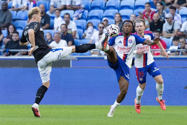 Arthur Piedfort and Zachary Christopher Athekame seen during Ligue 1 26 27 game between teams of Olympique Lyon and AJ Auxerre at Groupama Stadium (Benjamin Faes Ball Raw Images) Lyon Groupama Stadium France Copyright: xBenjaminxFaesx 0W4A1233