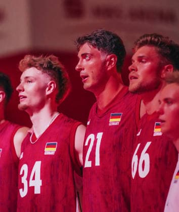 GER, Volleyball, European Championship Dress Rehearsal, Friendly Match, Germany vs. Netherlands, 09 26 04 National Anthem in Focus Tobias Krick, 21, Germany Photo: HMB Media Etienne Schlick Copyright: HMBxMedia EtiennexSchlick