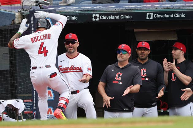 Cleveland Guardians Brayan Rocchio (4) is congratulated by manager Stephen Vogt after hitting a grand slam in the fourth inning against the Detroit Tigers at Progressive Field in Cleveland, Ohio on Friday, September 4, 2026.  CLE20260904108 AARONxJOSEFCZYK