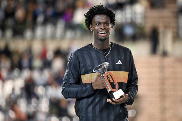 United States s Ja Kobe Tharp pictured with the Diamond League trophy after the 50th edition of the Memorial Van Damme Diamond League athletics event in Brussels, Friday 4 September 2026. ELIASxROM  x185285302x