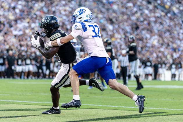 Sep 04, 2026; West Lafayette, Indiana, USA; Purdue wide receiver Chauncey Magwood (5) catches touchdown pass as Indiana State defensive back Gavin Hagan (32) pursues during NCAA, College League, USA football game action between the Indiana State Sycamores and the Purdue Boilermakers at Ross-Ade Stadium in West Lafayette, Indiana. Mandatory Credit: -Cal Media West Lafayette United States of America - ZUMAc04_ 20260904_zma_c04_012 Copyright: xJohnxMersitsx